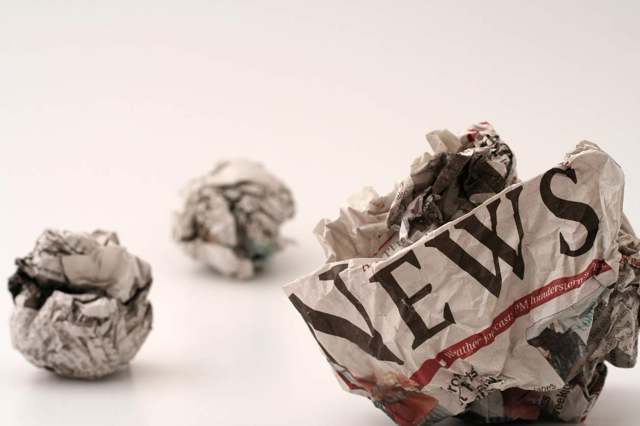 ball of generic newspapers with the word NEWS visible